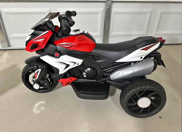 Kids ride on motorcycle