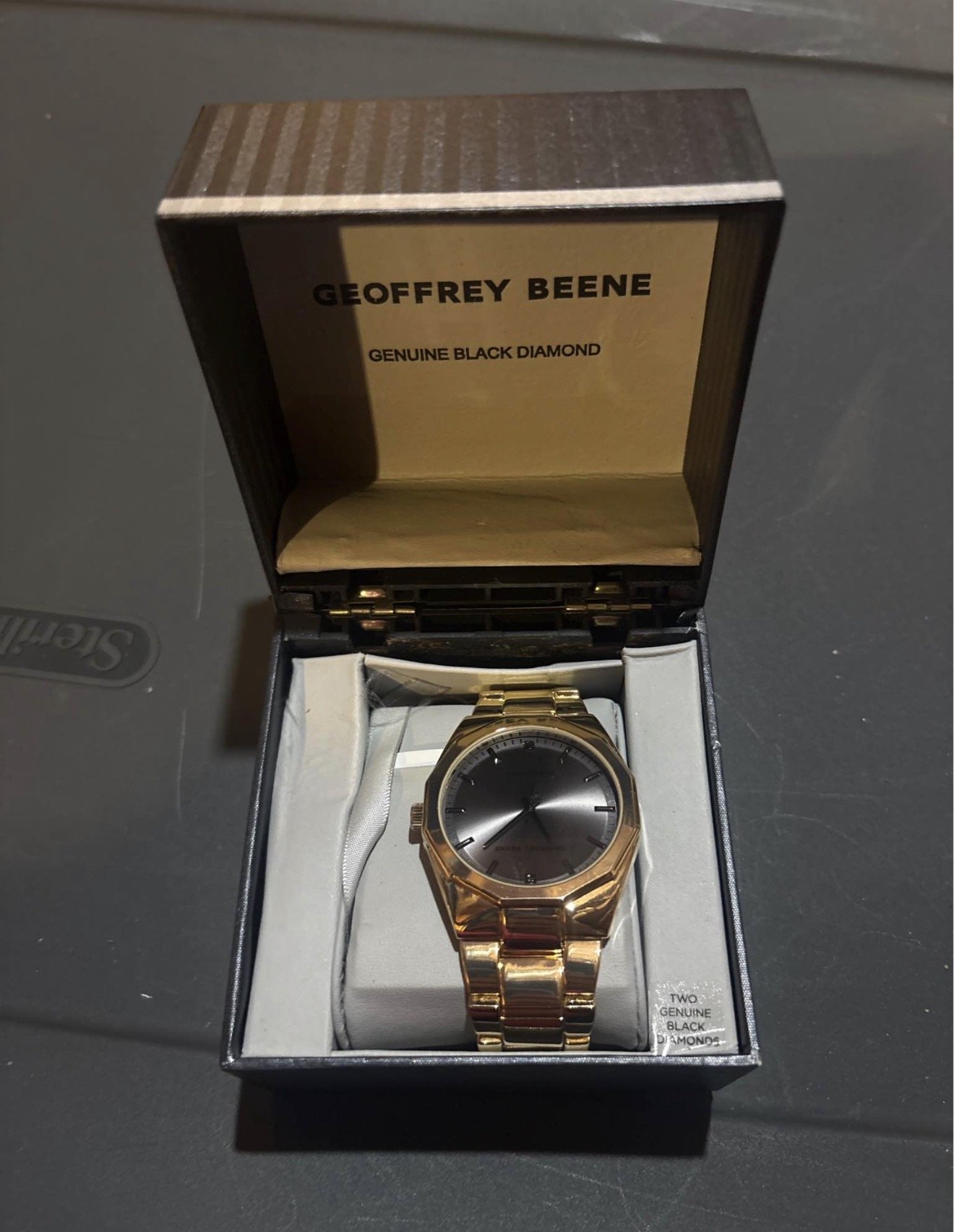 Men’s GEOFFREY BEENE new watch it needs a new battery p